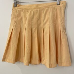 Prince vintage pleated mini Skirt in butter yellow